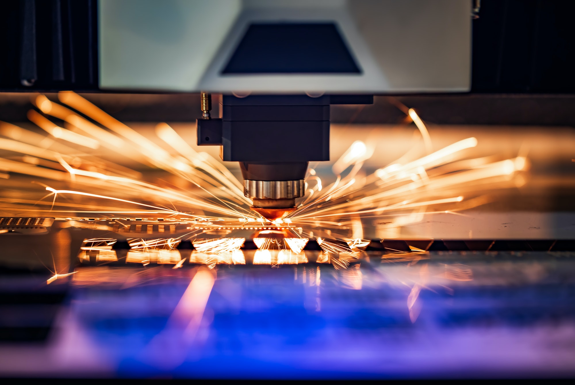 CNC Laser cutting of metal, modern industrial technology.